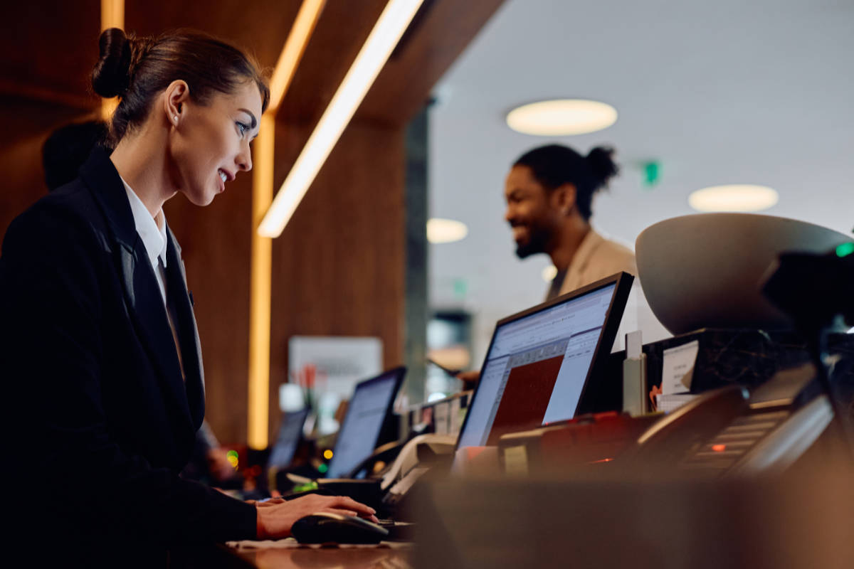 Hotel reception booking in a guest thanks for great hotel SEO