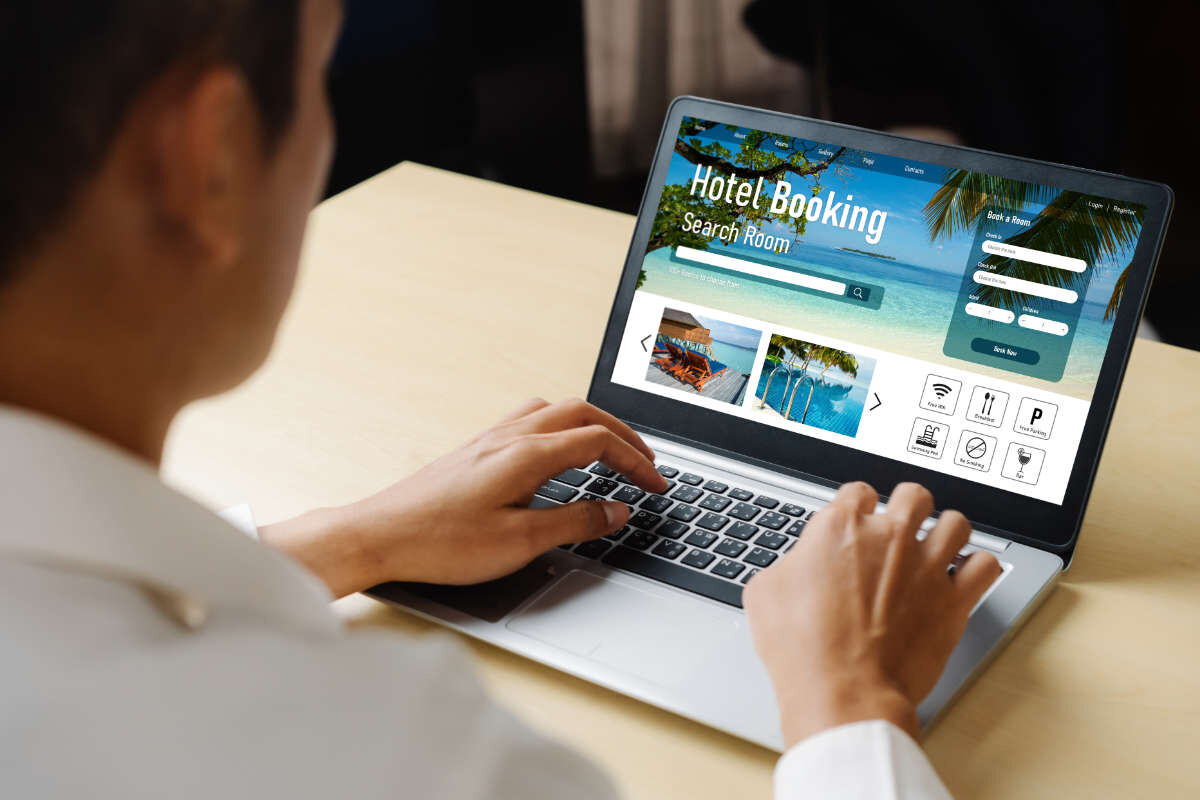 Online hotel booking using a laptop
